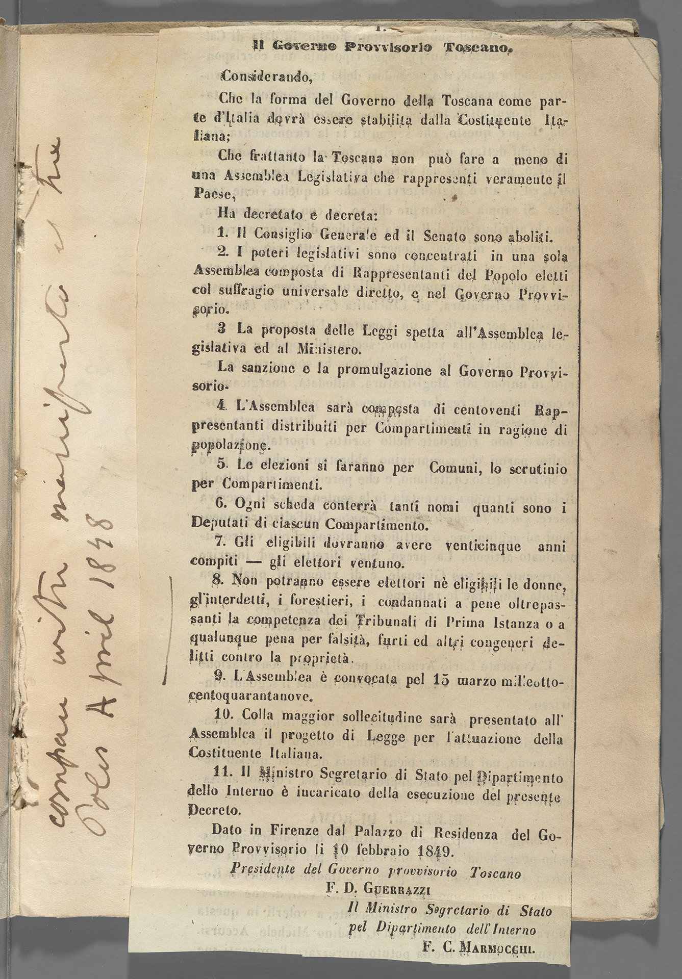clipping pasted into a scrapbook, with handwritten annotation